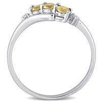 Miaенски Carat Carat T.G.W. Активен и дијамантски акцент 10kt бело злато 3-камен бајпас прстен